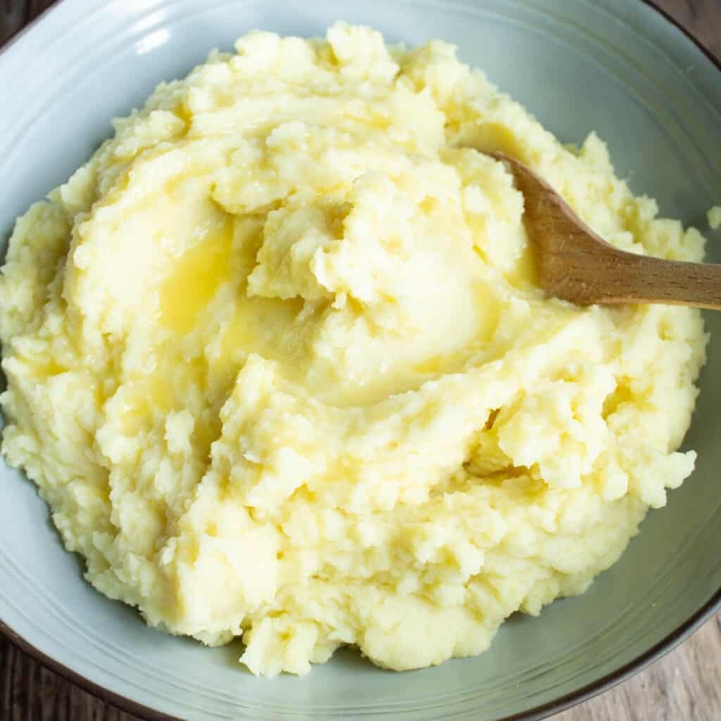 Super fluffy mashed potatoes in a bowl