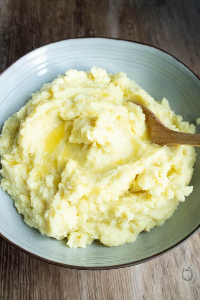 Super fluffy mashed potatoes in a bowl